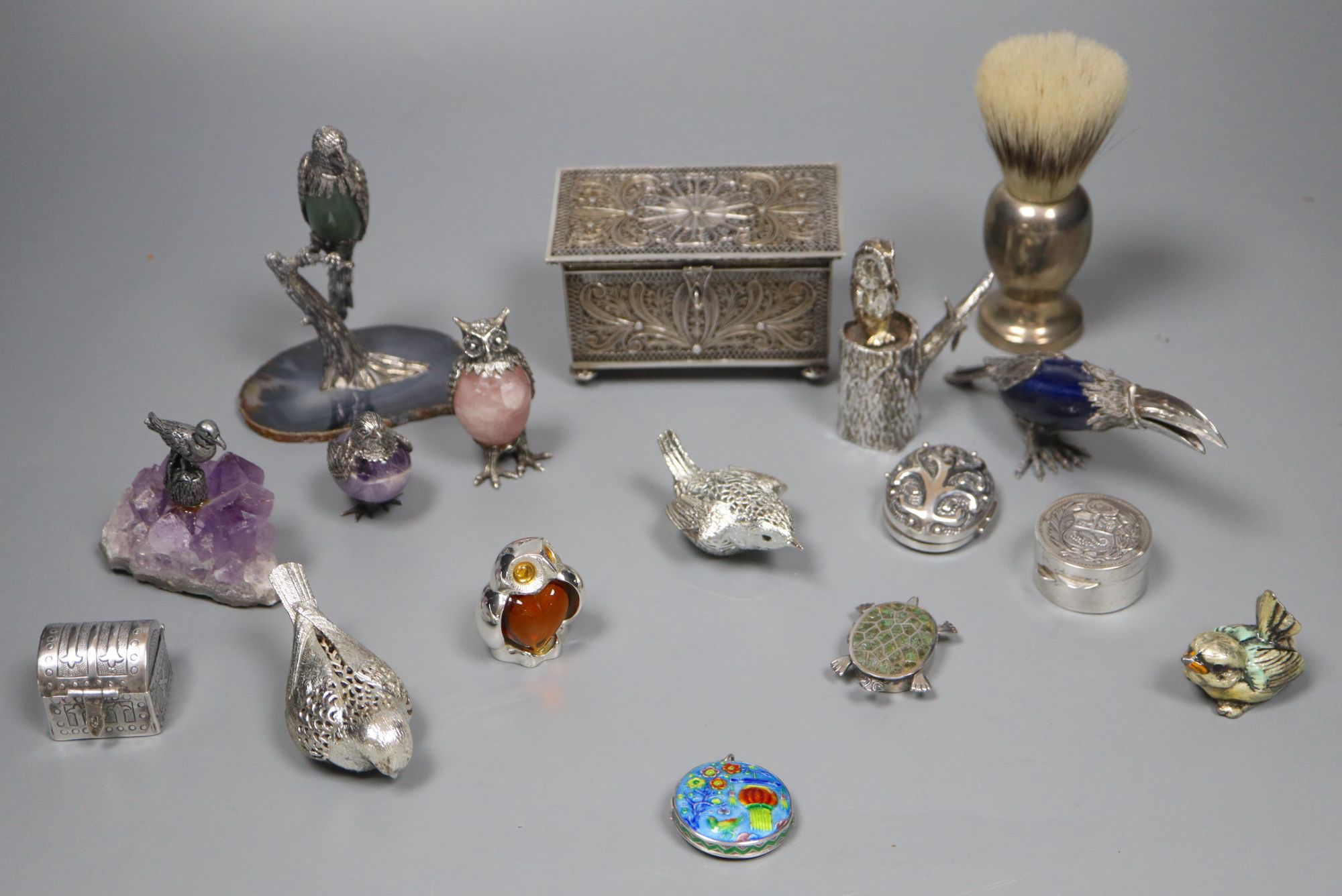 A group of small silver, plated and white metal items